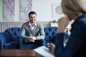man learning about primary care services